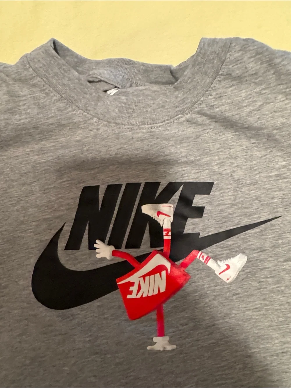 Nike Gray Tee with Black Swoosh and Red Graphic